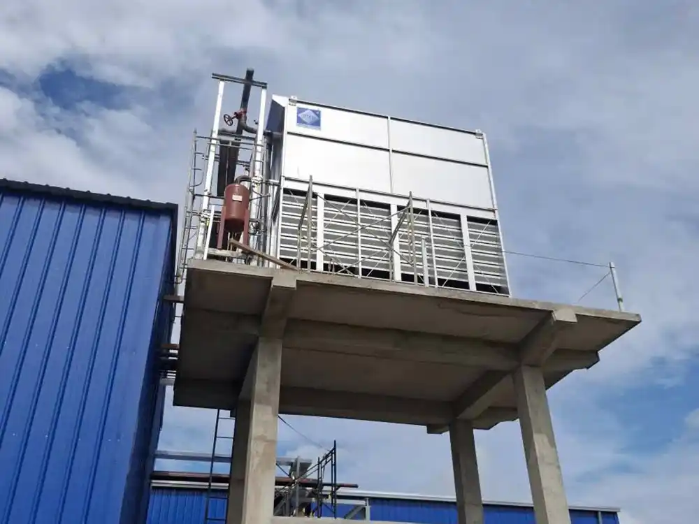Evaporative condenser ZHX-1100 installation at Vietnamese seafood processing plant with Mayekawa ammonia compressor