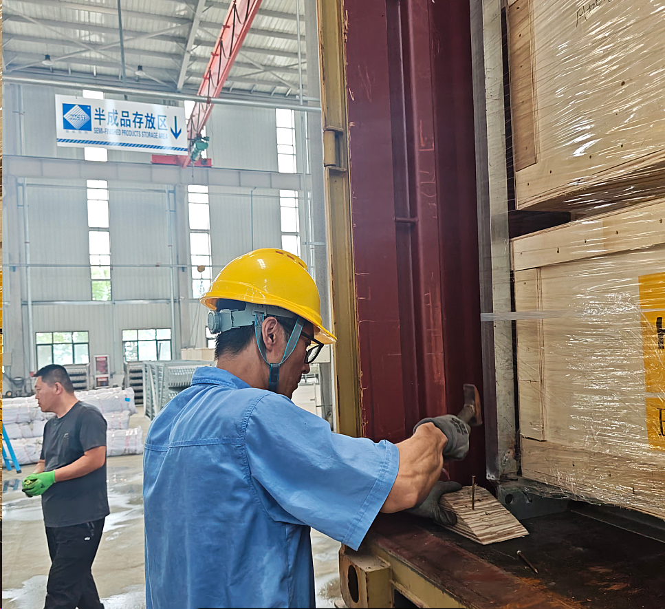 HACST worker checks export cargo and air cooler packing inside a shipping container