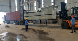 Forklift loading an air cooler into a shipping container for Middle East delivery